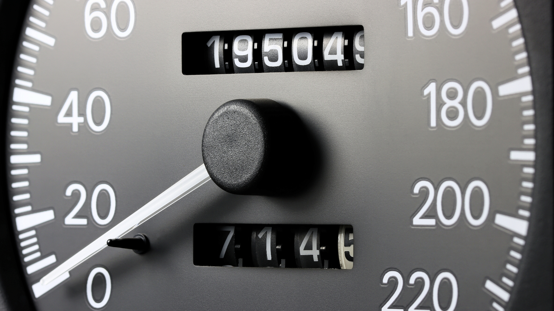 An odometer showing 195,049 miles on it.