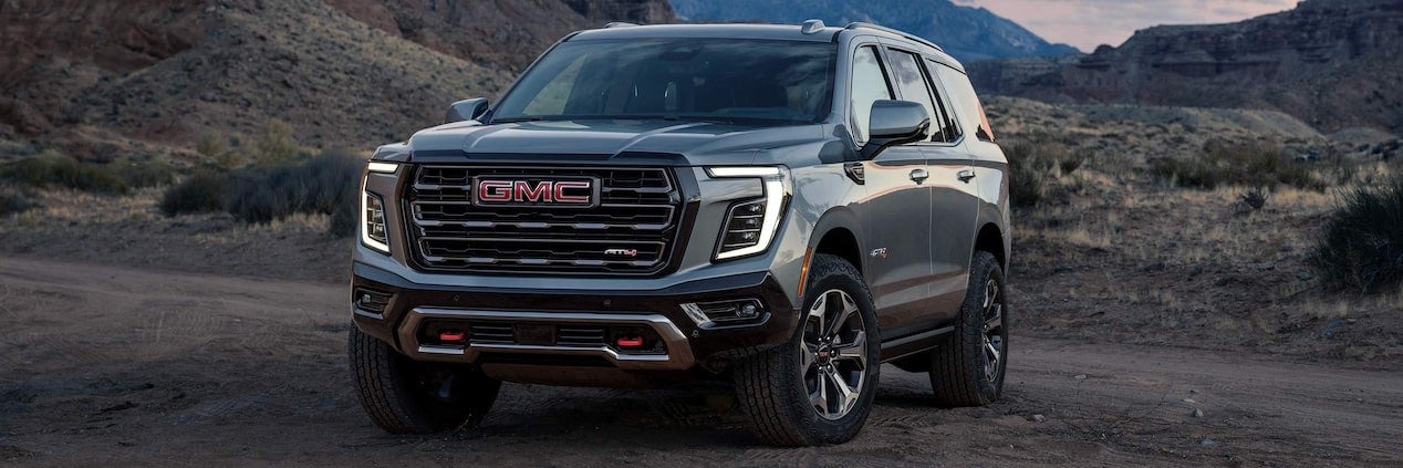 2025 GMC Yukon parked on a rocky hill